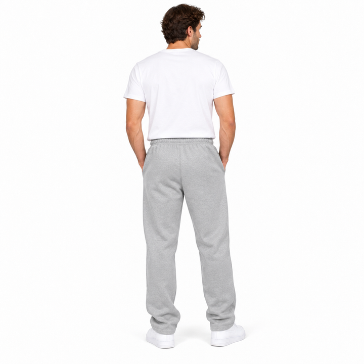 Light gray sweatpants back view on a full-body male model against a white background