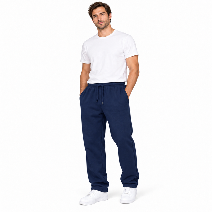 Navy blue sweatpants on a male model with a relaxed straight-leg silhouette