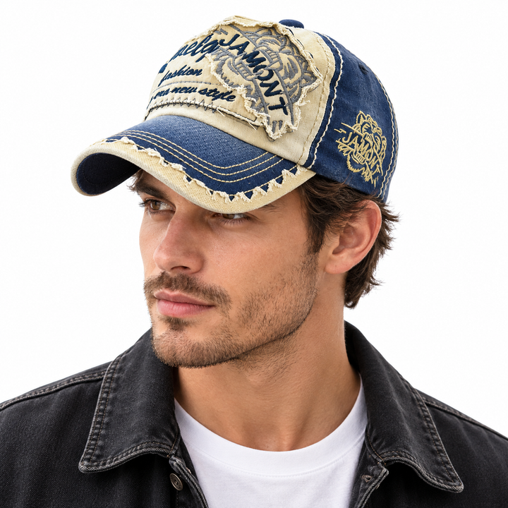 Male model wearing the Navy / Sand tiger baseball cap