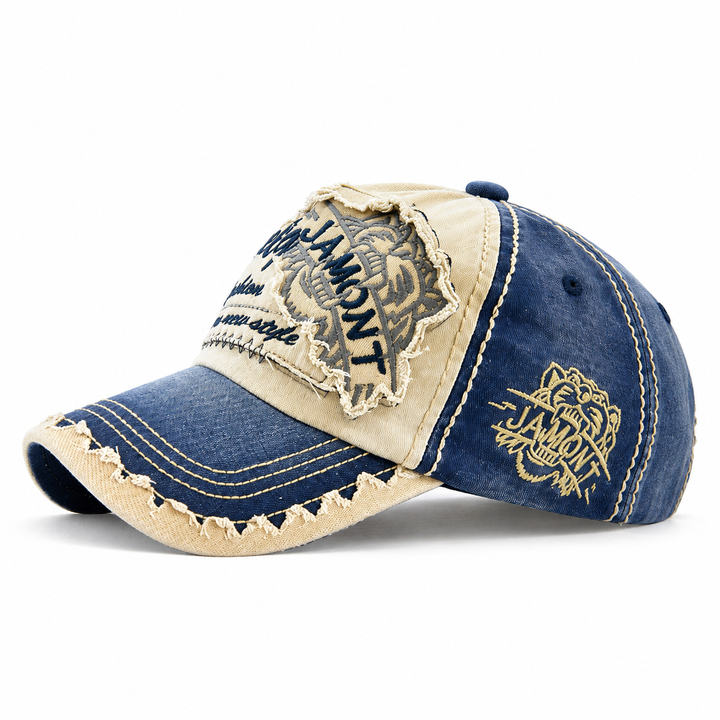 Side view of Navy / Sand cap with curved distressed brim