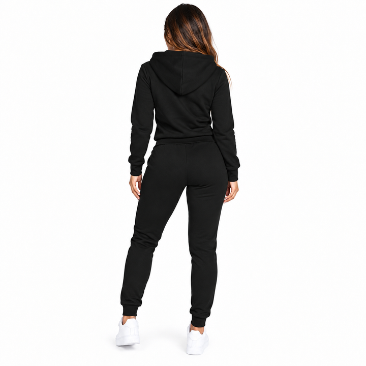 Black hooded tracksuit back view showing the coordinated top, jogger shape and cuffed ankles