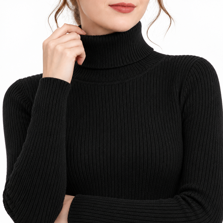 Close-up of the tall turtleneck collar and sleeve cuff, showing the verified rib-knit construction and neatly finished edges.