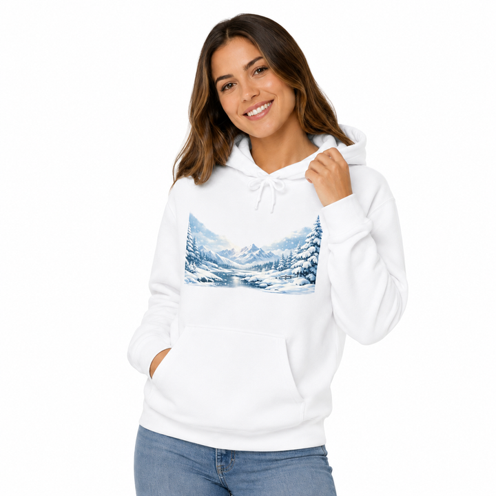 Woman modeling the unisex heavyweight white hoodie in a three-quarter studio pose with winter landscape chest print visible