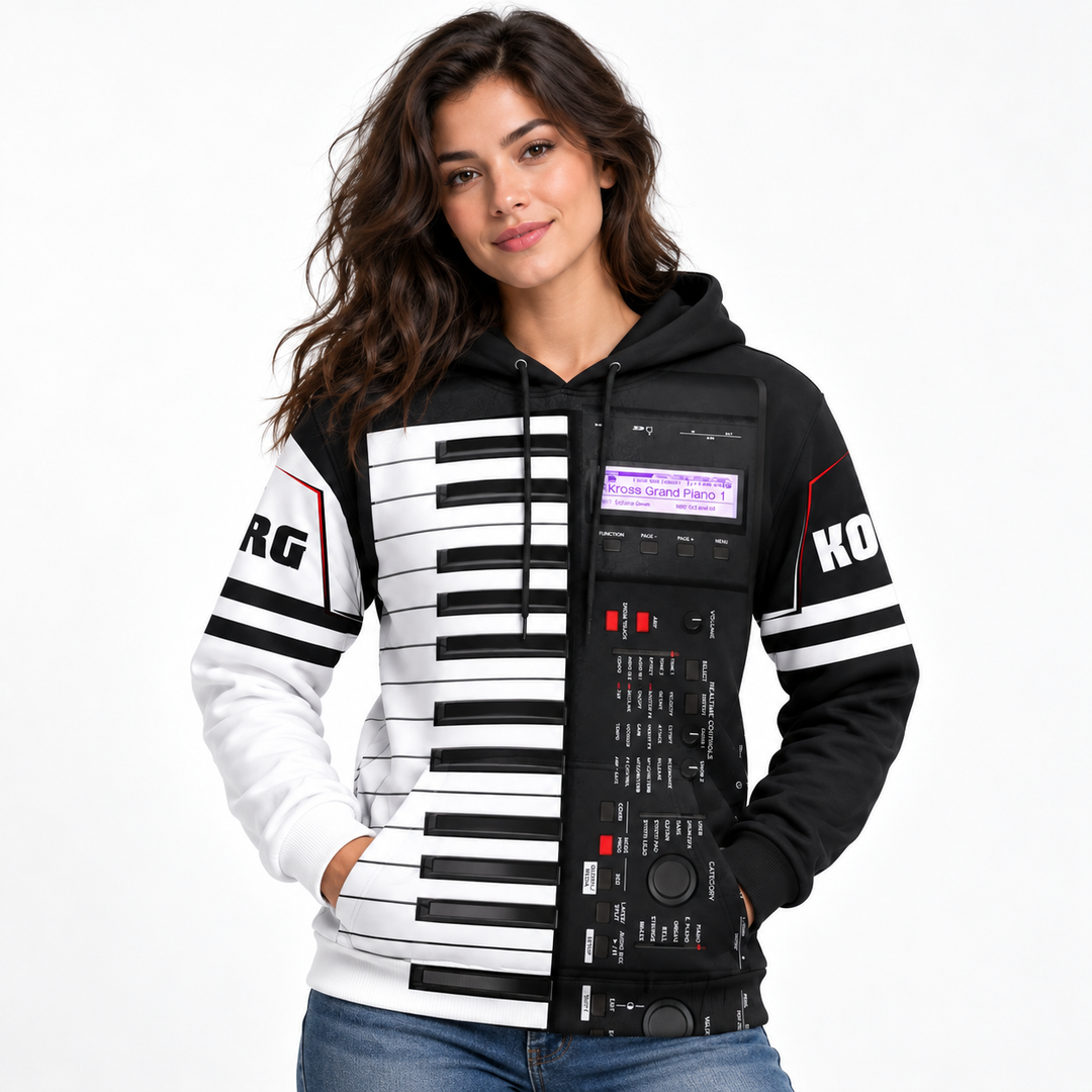 Female model wearing the unisex black and white keyboard print hoodie in a clean studio setting with full front design visible.