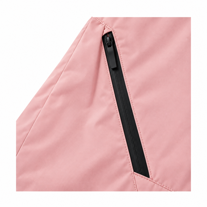Pink jacket pocket detail showing the angled black zipper and stitching