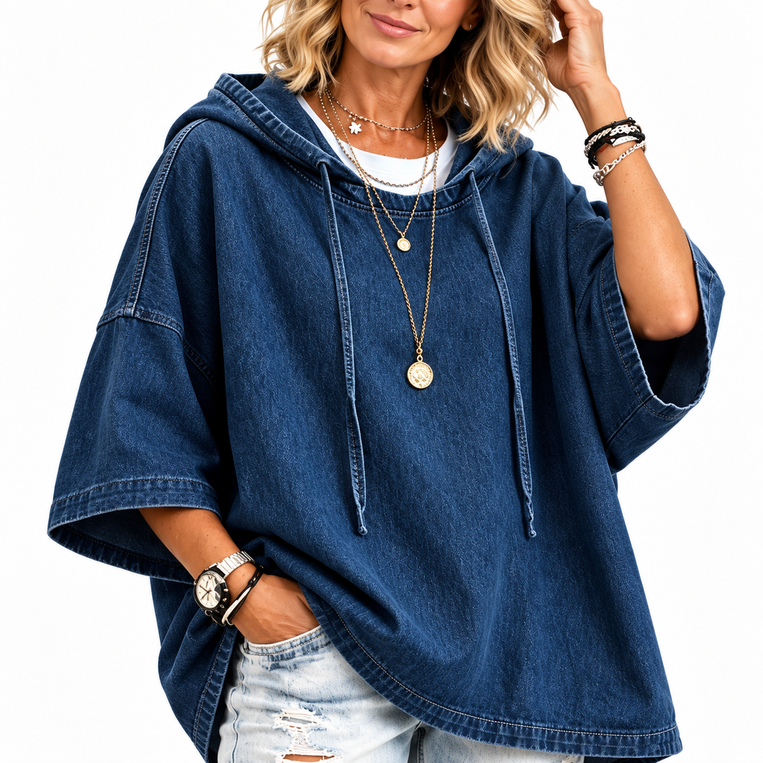 Navy washed denim hoodie top close-up showing hood, drawstrings and stitching