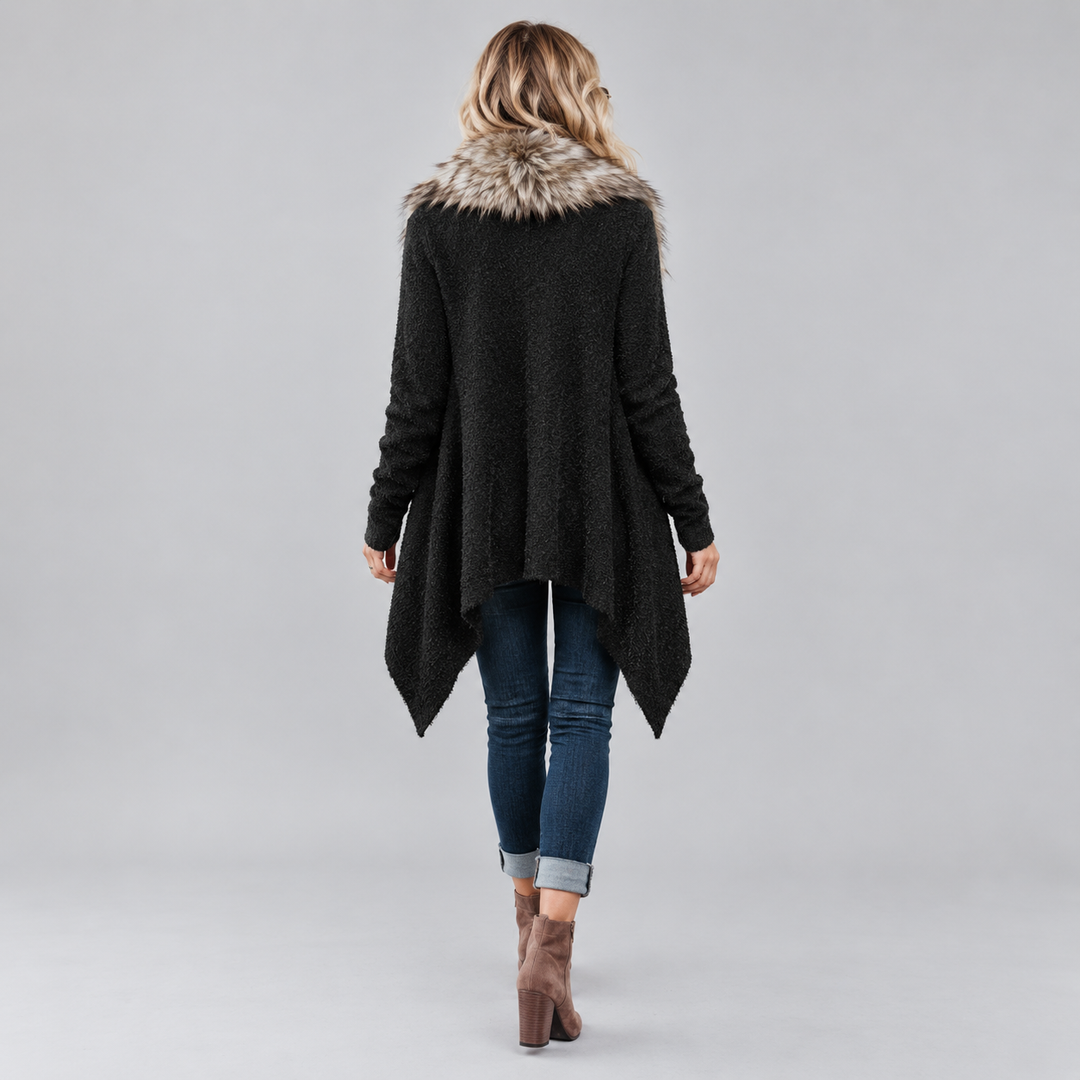Back view of Black open-front cardigan on a female model showing long sleeves, plush collar and asymmetric pointed hem shape.