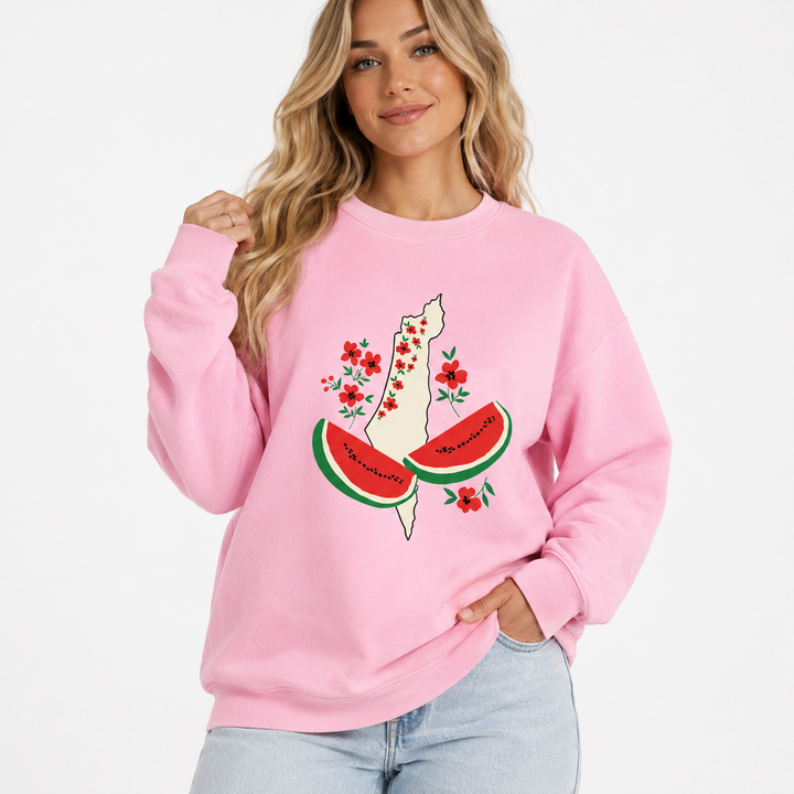 Pink watermelon sweatshirt for women shown in a close model view with crew neck, long sleeves and floral watermelon graphic details.