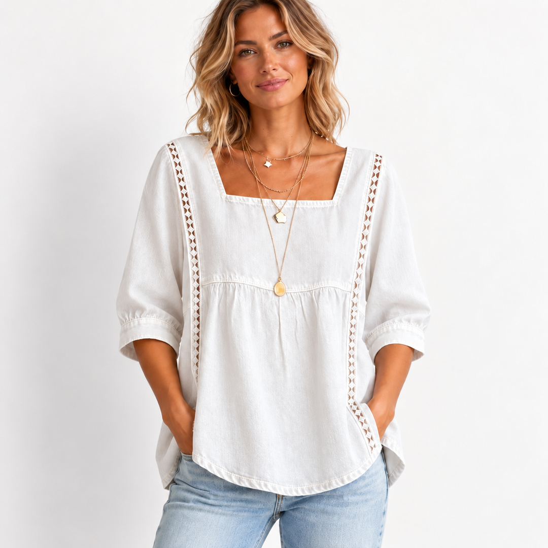 Studio model view of the white blouse reference with square neckline, regular sleeves and vertical lace patchwork trim.