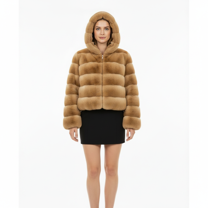 Front view of the hooded faux fur coat for women with short length, long sleeves, practical hood and plush polyester texture.
