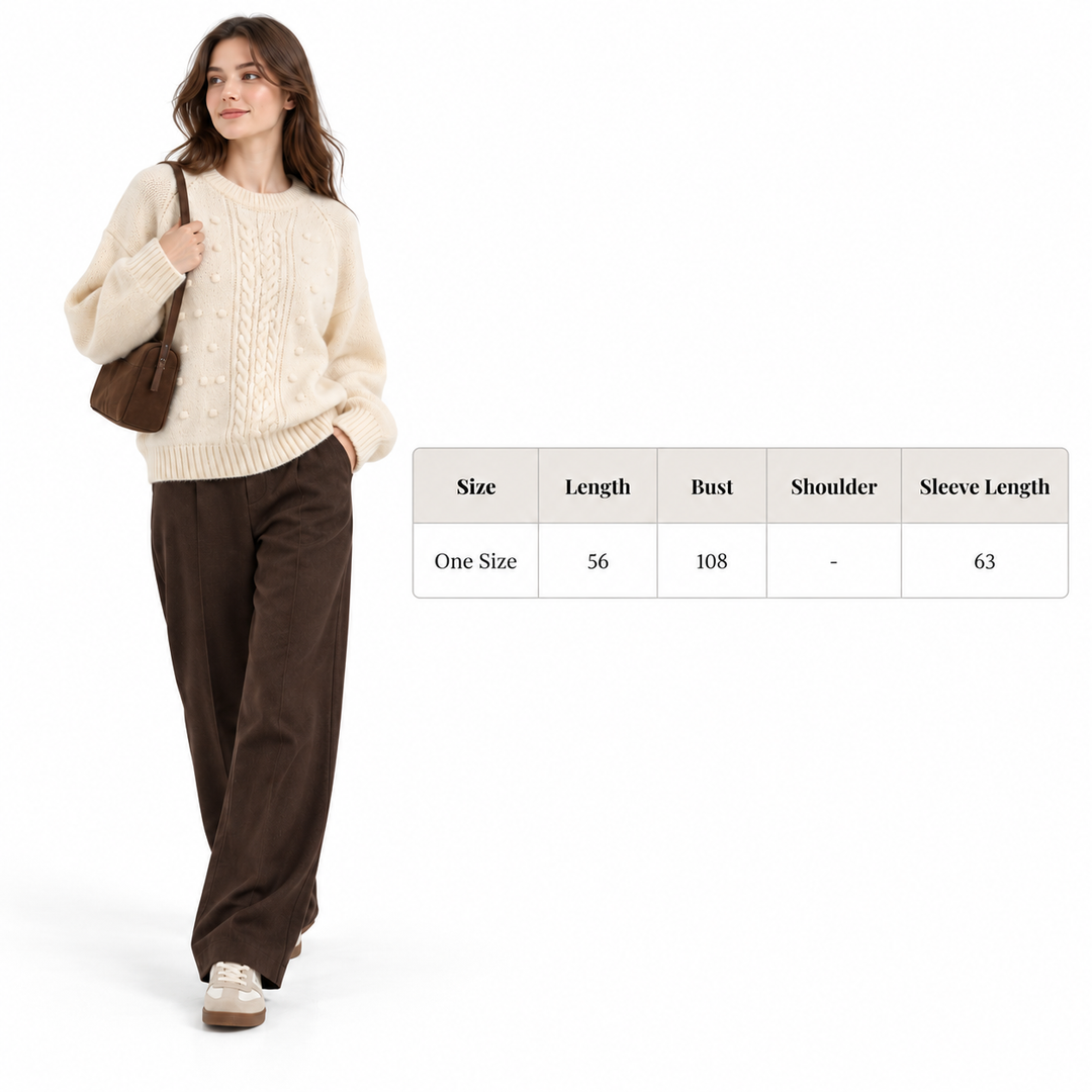 Ivory cable knit sweater on model with One Size measurements in centimeters