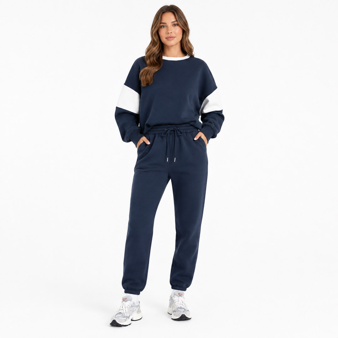 Women's navy drop shoulder sweatshirt set front view on model against a clean white studio background