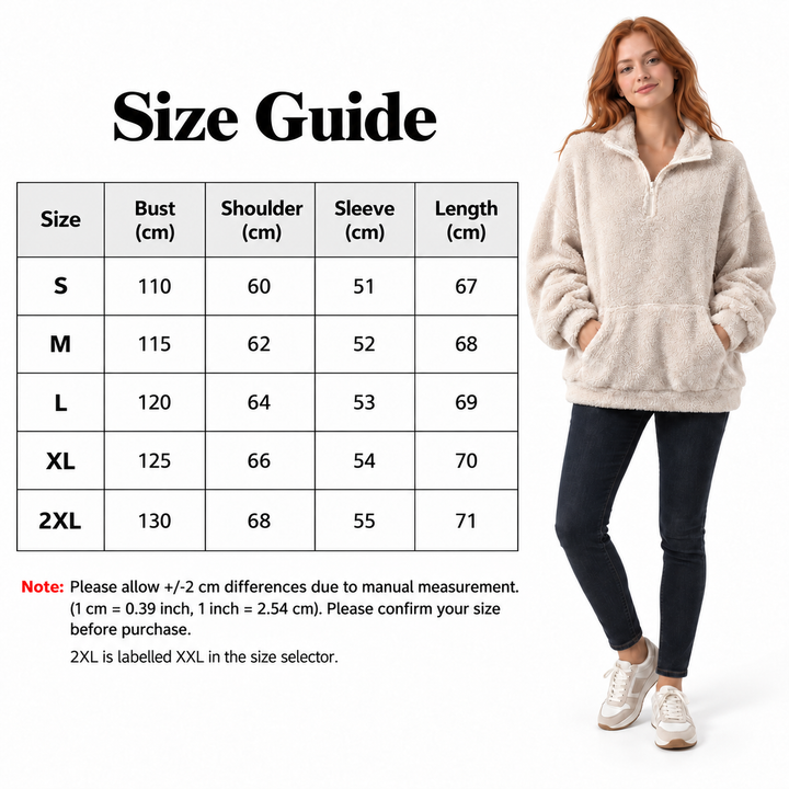 English size chart with bust, shoulder, sleeve and length for S to 2XL, beside a red-haired model wearing the Beige pullover.