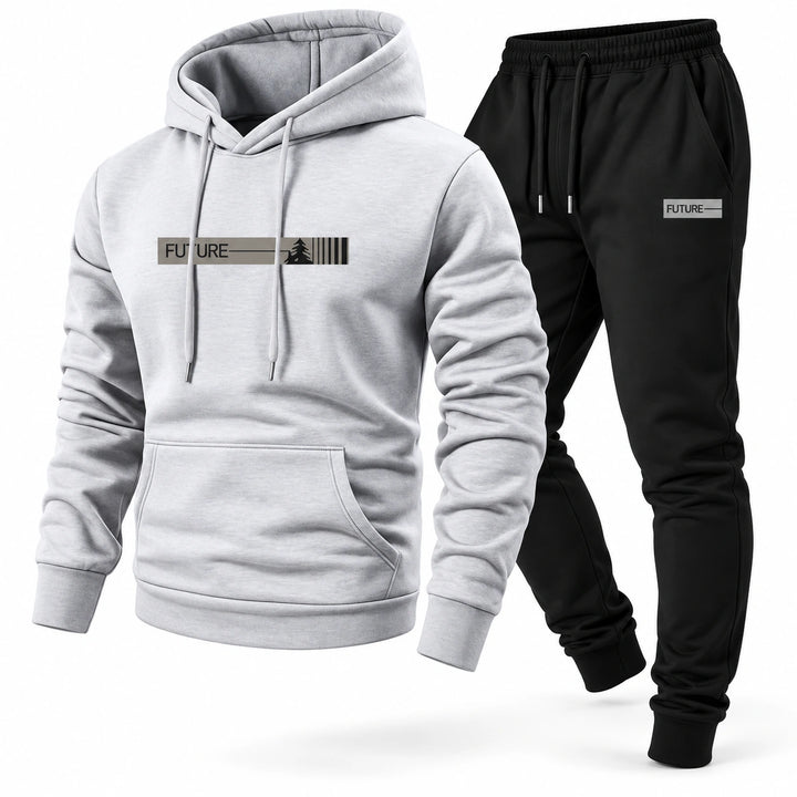 Three-quarter studio view of the light gray hoodie and black pants set