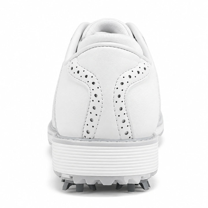Rear view of the white golf shoes showing heel stitching and the ribbed sole