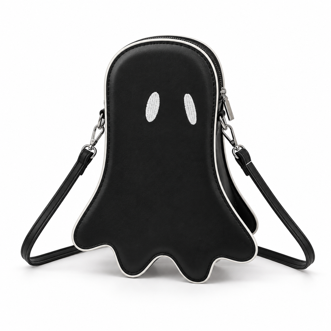 Black Halloween ghost crossbody bag front view with white eyes, contrast piping, zipper and long shoulder strap