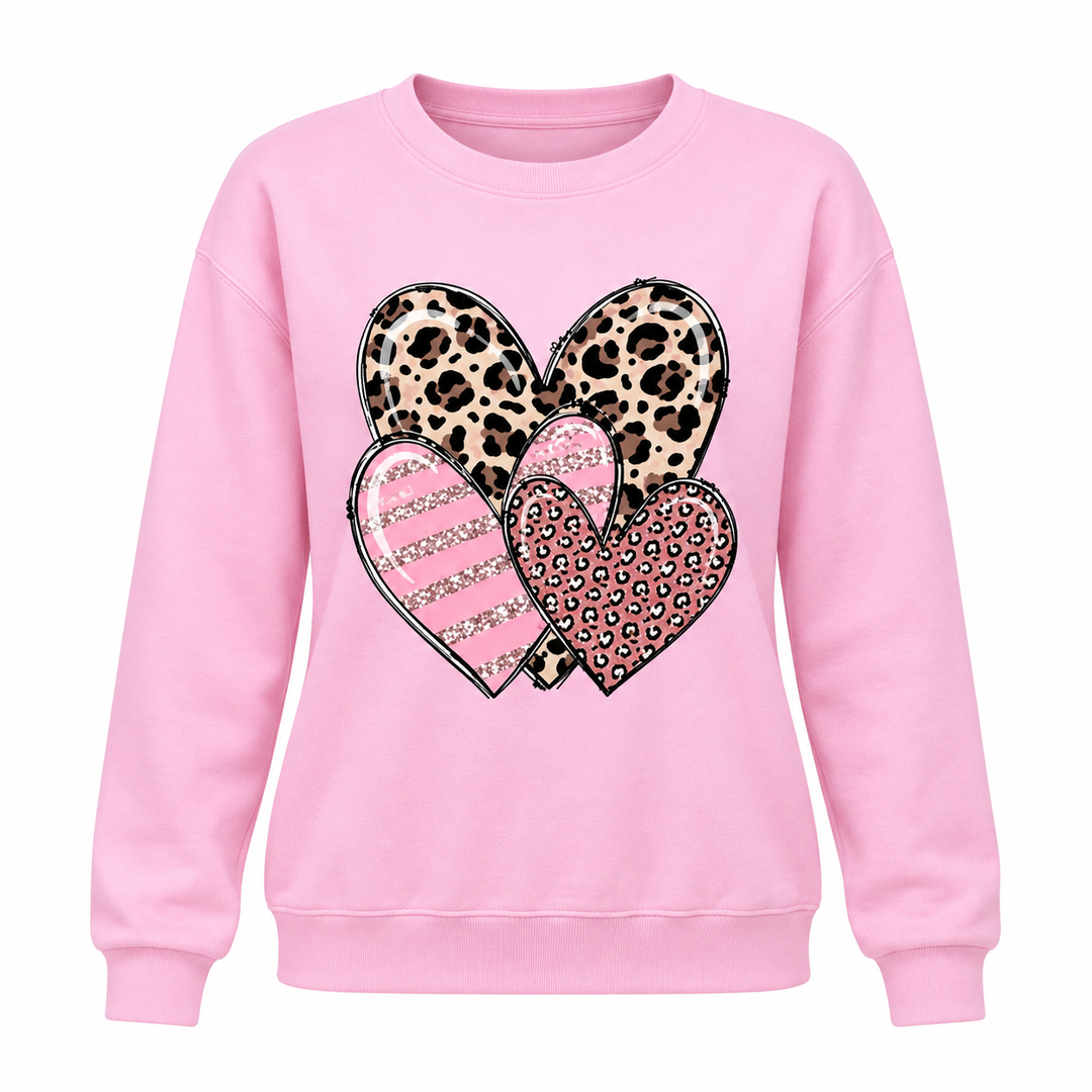 Pink long sleeve heart print top shown from the front with the full graphic and garment shape visible.
