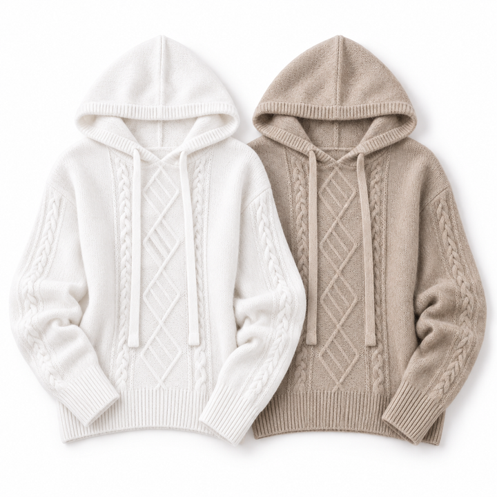 White and light camel hooded jacquard knit sweaters arranged side by side on a white background to compare the two color options.