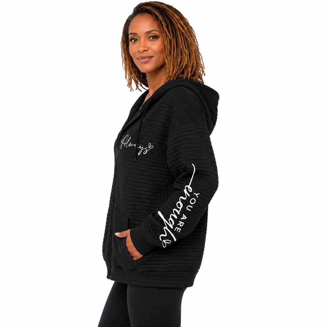 Side black letter zip hoodie on model showing hood, sleeve graphic, pocket depth and silhouette on white background set view.