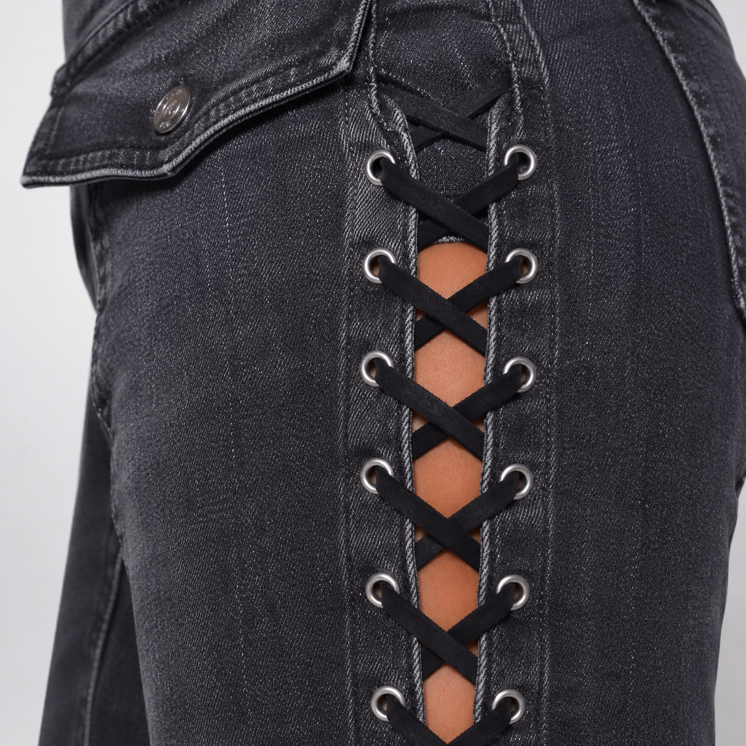 Retro Black jeans close-up showing denim cotton texture stitching metal eyelets and lace-up panel details shopping reference.