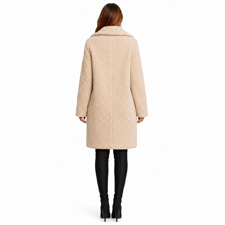 Dark khaki teddy coat back view on model, showing the straight silhouette, textured surface, long sleeves and mid-length hem.