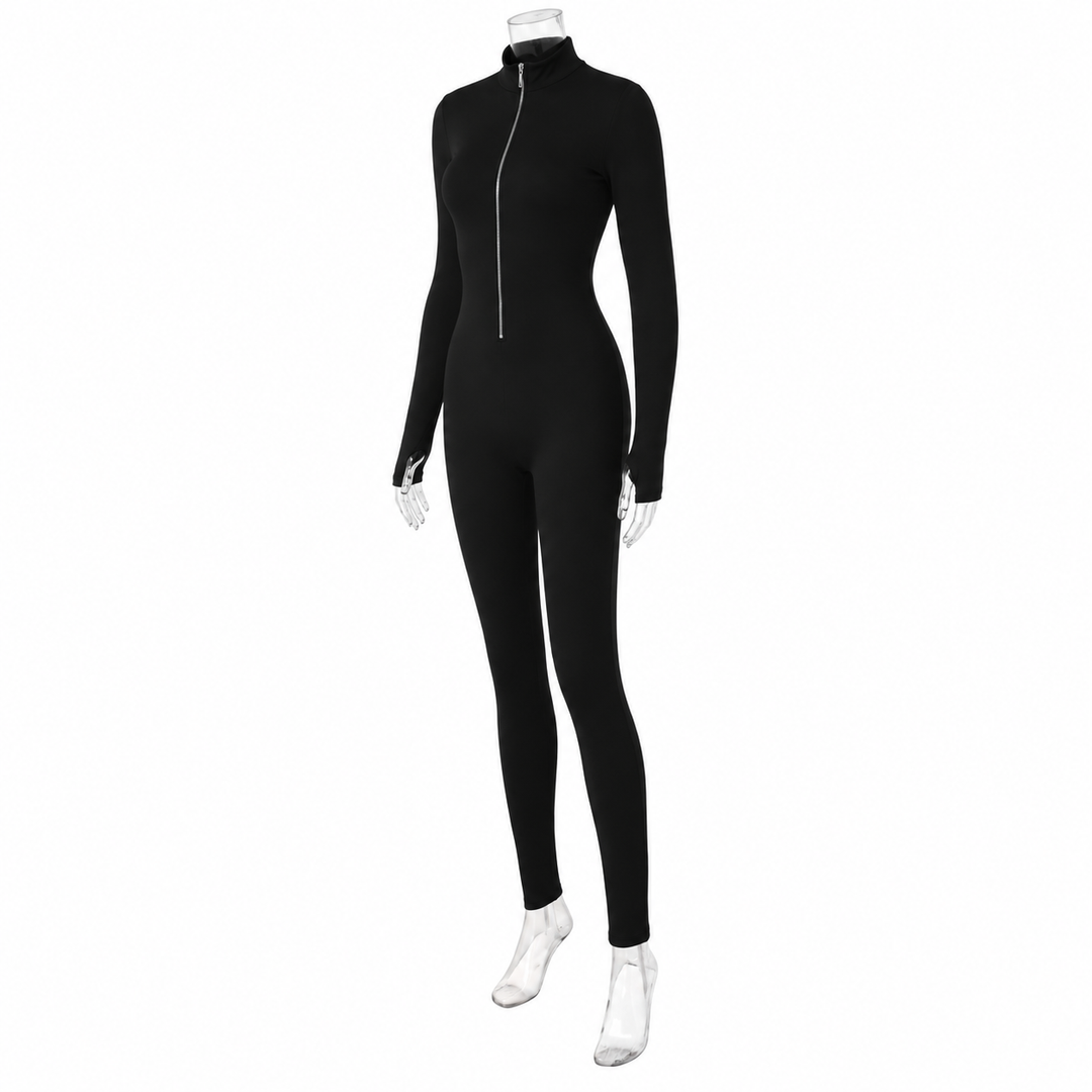 Black jumpsuit on a mannequin in three-quarter view, showing the silver zipper, stand collar, long sleeves and slim-fit legs.